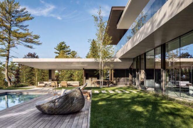 wicker chair beside a pool