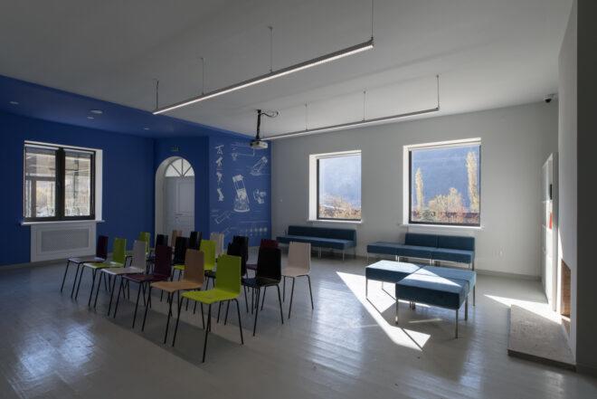 white and blue classroom with square windows