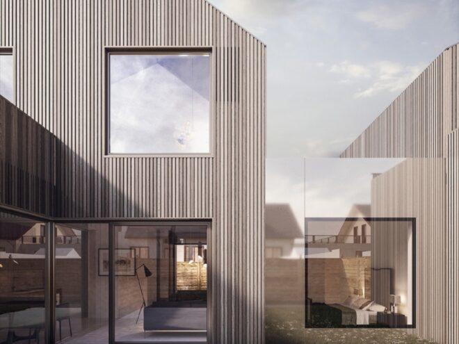black timber home with large square windows