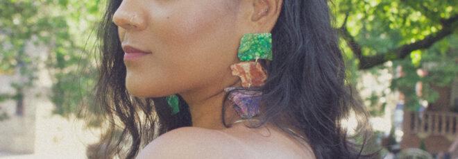 close-up of multicolored stone earrings