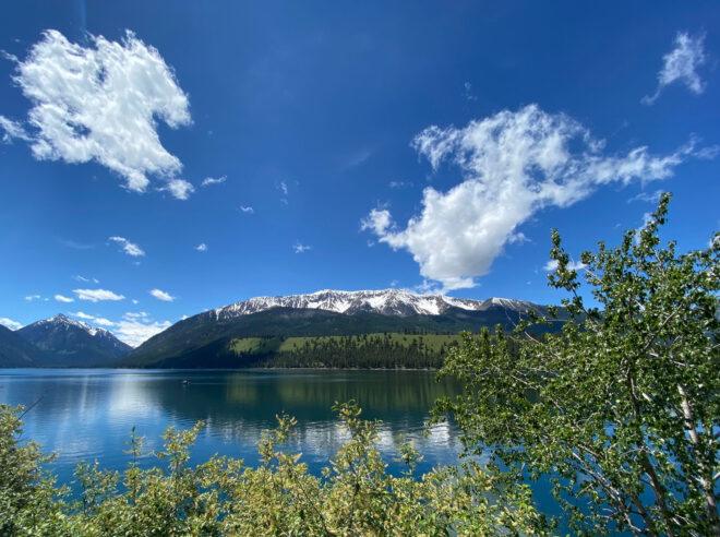lake in the foreground and mountains in the distance