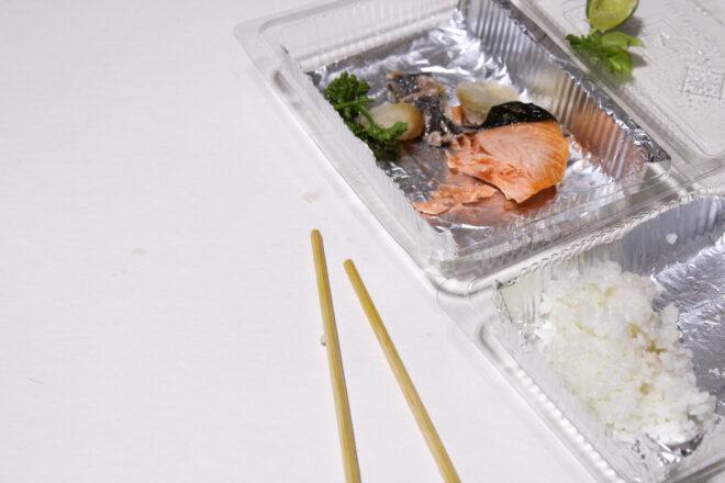 leftover fish in a tin container