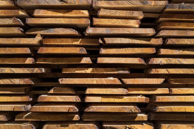 stacks of treated wood planks