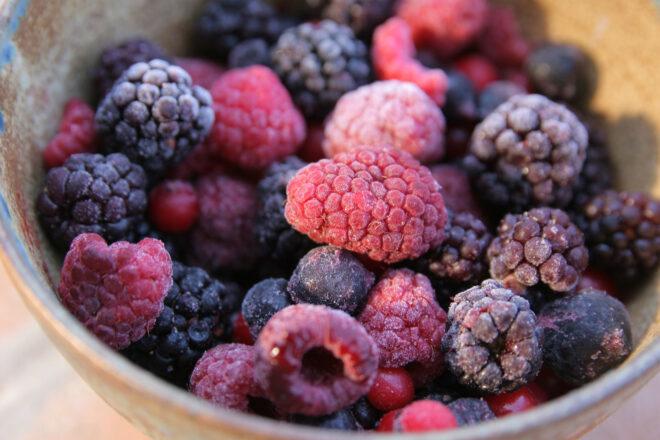 frozen raspberries and blackberries in a bowl