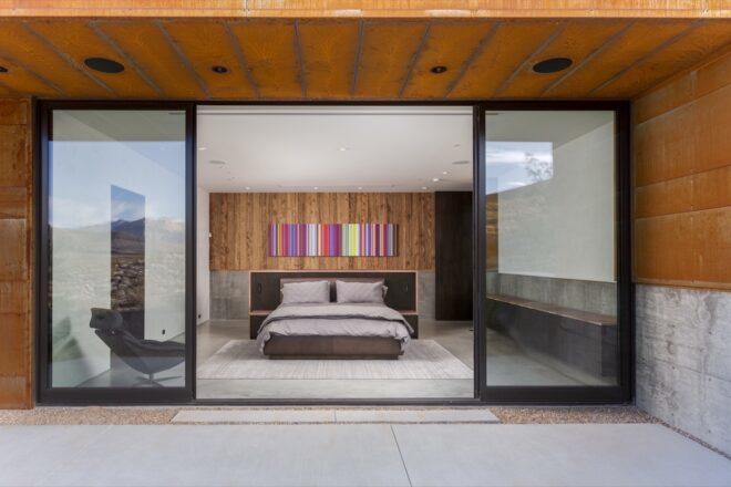 bed facing sliding glass doors