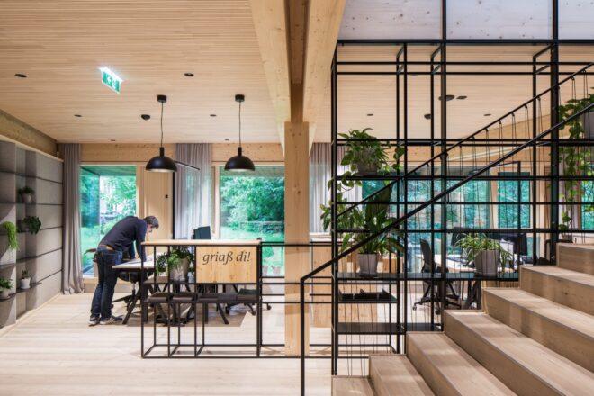 staircase with black metal rail