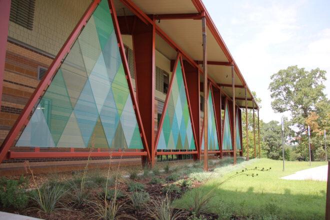 close-up of colorful triangle details on Camp Trivera building exterior