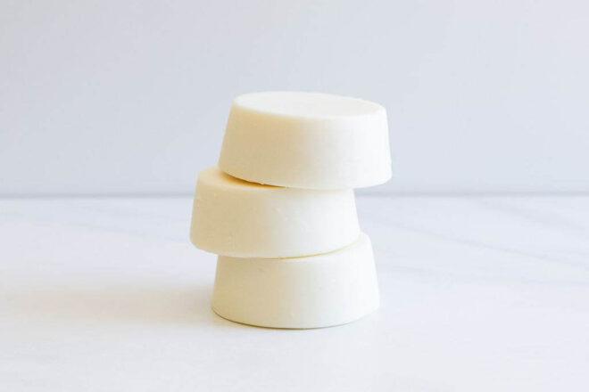 white shampoo bars on white background