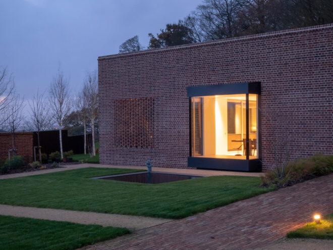 brick home with large square window