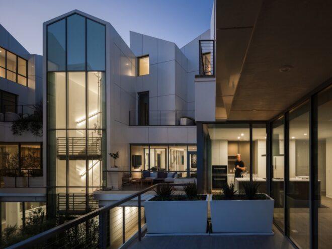 large white building with varying sizes of windows