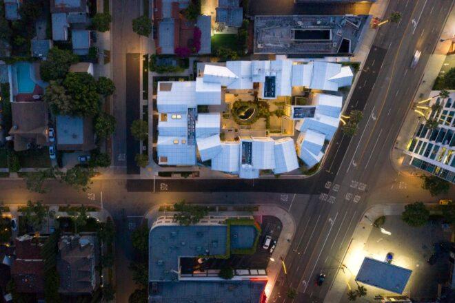 aerial view of white gabled roofs in a city