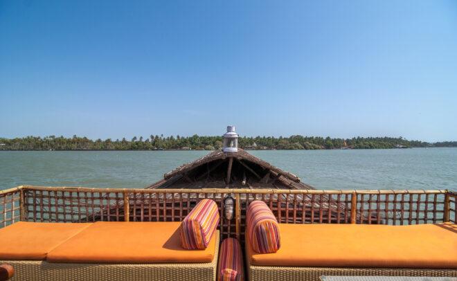 boat deck with orange lounge seats