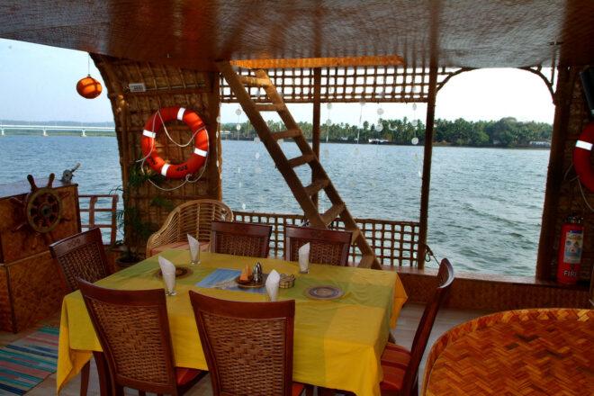 dining room on a boat with open walls and water views