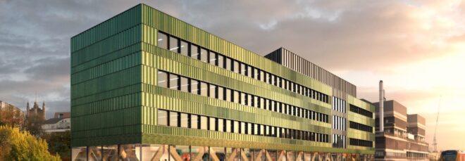 green office building at sunset