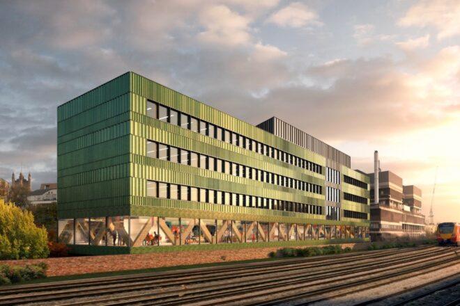 green office building at sunset