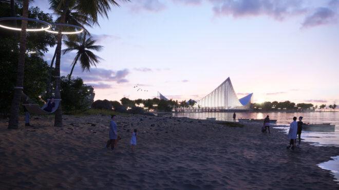large building near beach lit up at dusk