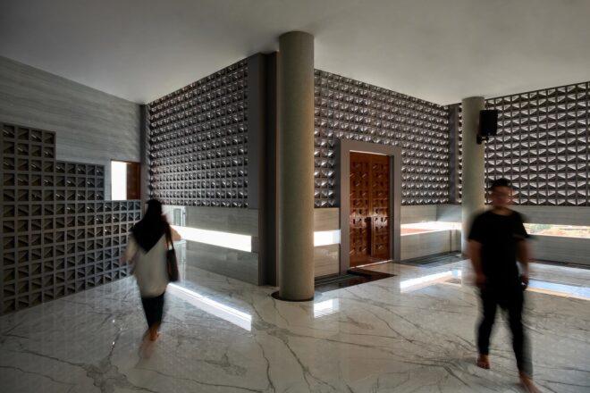 mosque interior with gray walls and marble floors