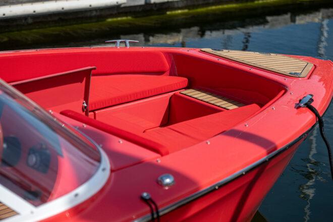 seats inside a red speedboat