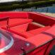 seats inside a red speedboat