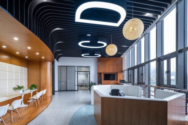 reception with wood desk and wood walls plus one wall of glass