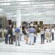 rendering of people looking at walls of stored art