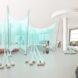 rendering of web-like material hung from ceiling in an art depot