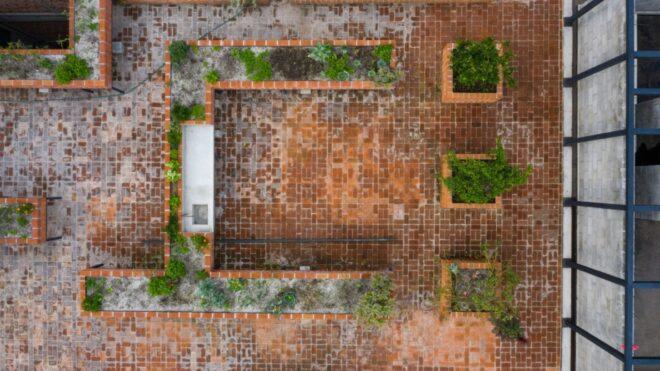 aerial view of garden on a brick rooftop