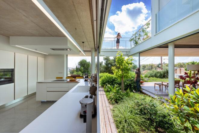 long kitchen counter facing a central garden