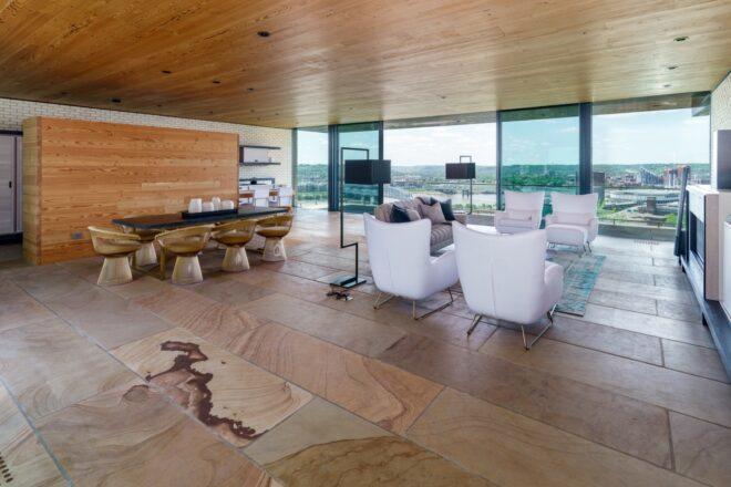 modern home with natural wood floors and white furnishings