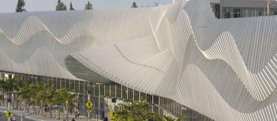 convention center building with large metal exterior with a wavy pattern