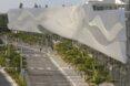 convention center building with large metal exterior with a wavy pattern
