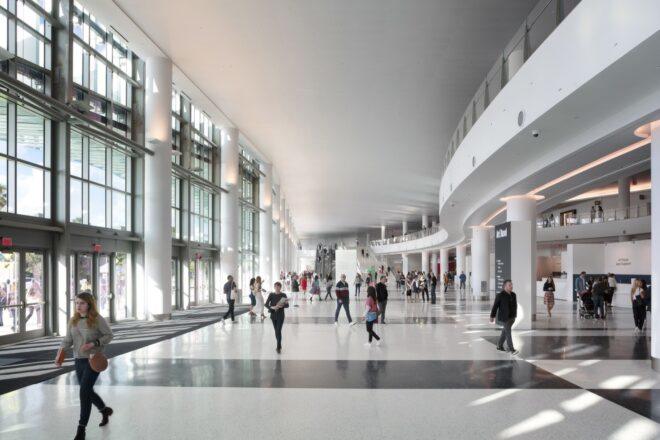conference interior with white floors and wall of glass