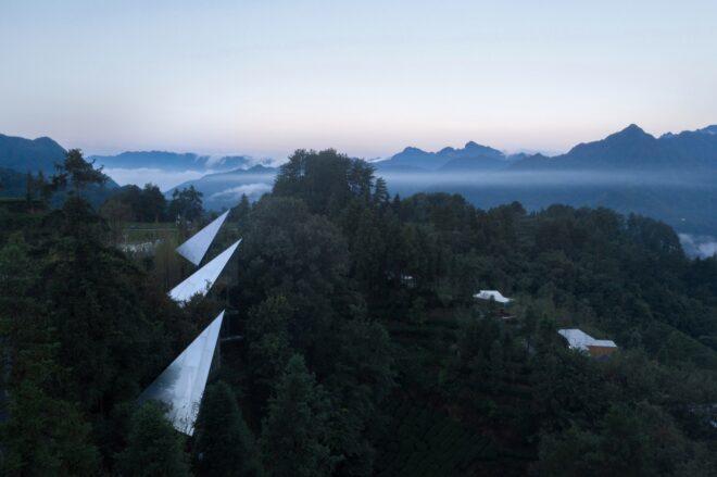 triangular cabins in forest
