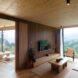 wood-lined interior with wood furnishings and floor-to-ceiling windows