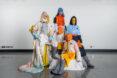 people in yellow, orange and blue fashionable clothing