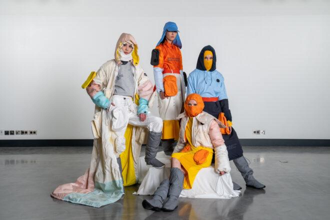 people in yellow, orange and blue fashionable clothing