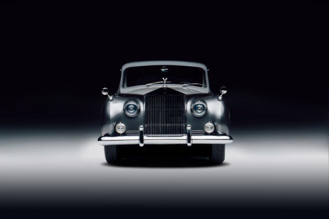 front of gray Rolls-Royce Phantom