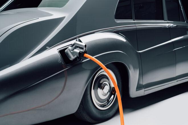 electric charger plugged into gray Rolls-Royce