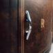 Rolls-Royce emblem stamped into dark cabinet