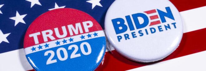 Biden for President button and Trump 2020 button on American flag background