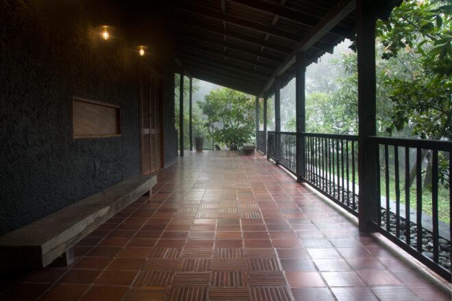 long covered patio with natural tiled floors