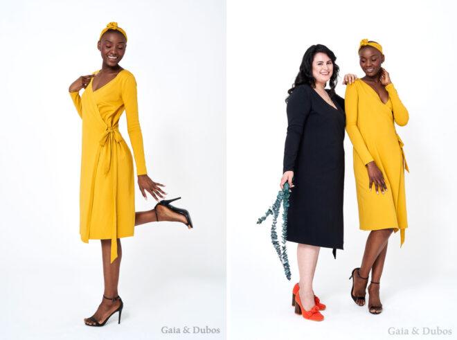 On the left, person in yellow dress with matching headband. On the right, person in black dress standing beside person in yellow dress