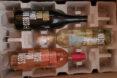 red wine, white wine and rose packed in cardboard box