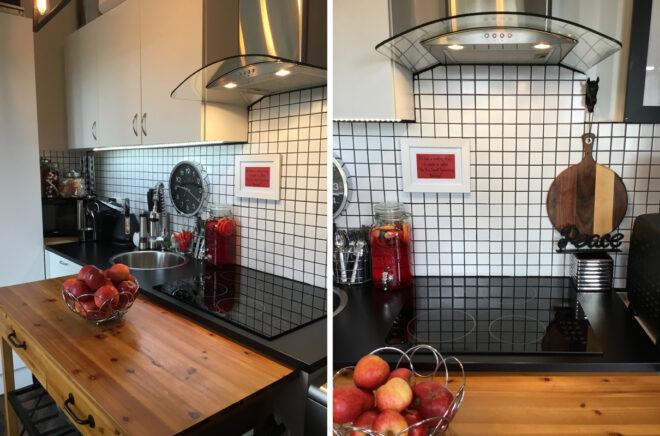 tiny kitchen with wood island and white tile backsplash