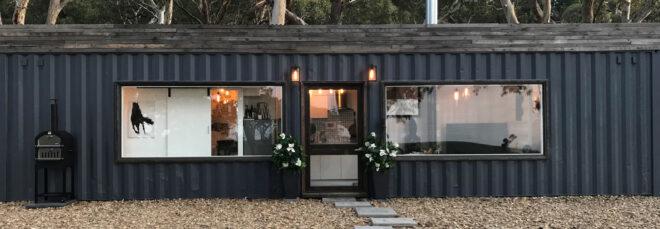 black corrugated metal tiny home