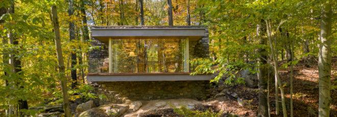 stone cabin with glass walls