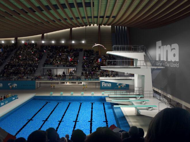 a person diving into a large pool.
