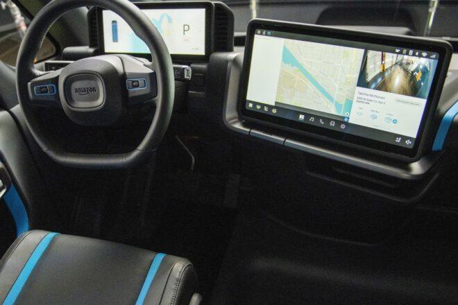 digital screens with maps in an electric van