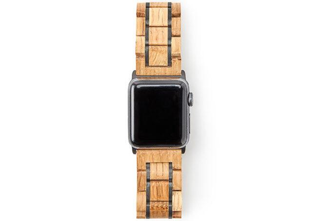 an Apple watch with recycled barrel wrist-strap.