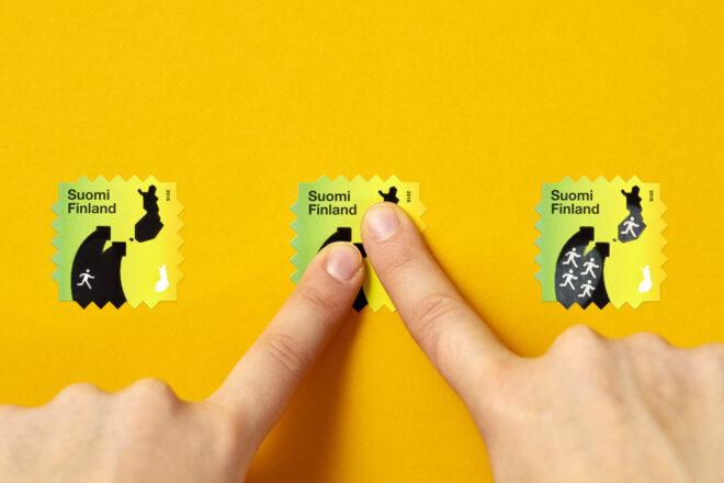 three green stamps against a yellow background. from left to right, the stamps show one figure migrating, then a person pressing their finger to the stamp, and finally the stamp showing many people migrating.